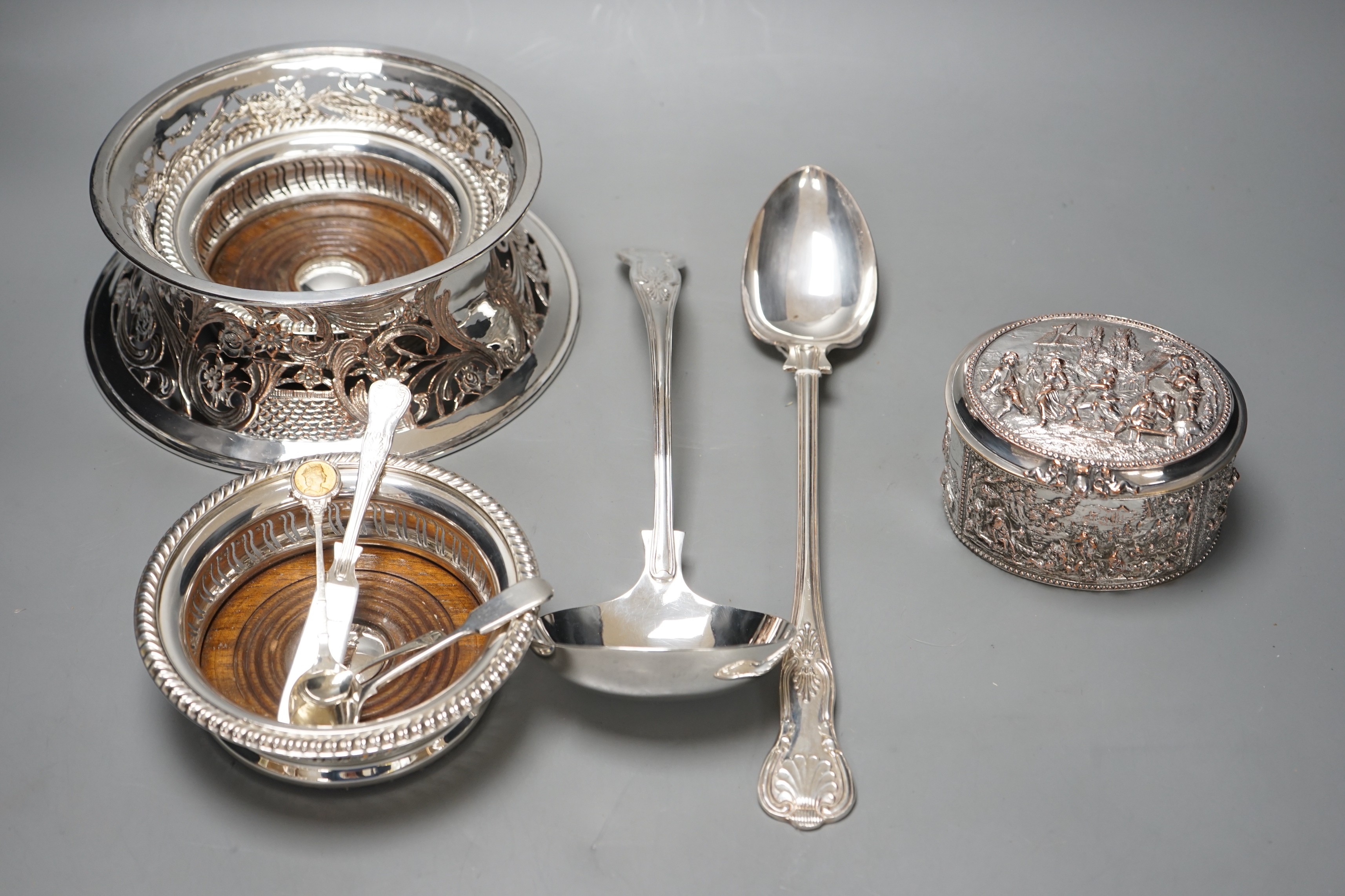 A plated dish ring, a pair of plated coasters, electrotype box, platted basting spoon and soup ladle and four spoons